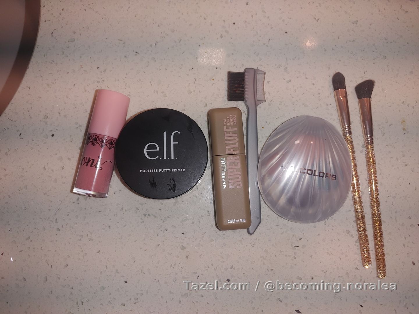 Check out my look with these makeup items:
ioni liquid blush light pink DT
elf poreless putty primer
mabeline fluffer brow
LA colors shell eyeshadow DT
LA colors duo pink lipstick / glitter gloss DT (not pictured)

+ DT nails: Ladybird fashion nails and ioni glue in the squeeze bottle